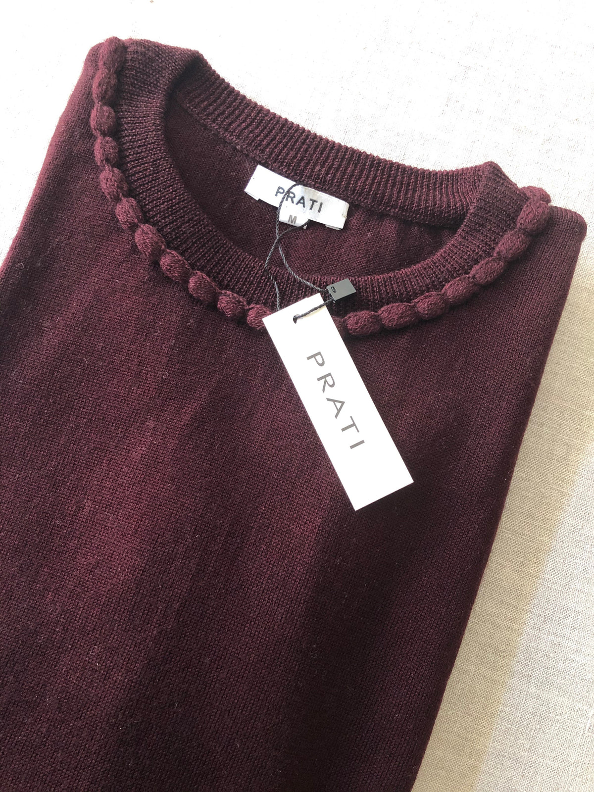 Cashmere pom pom sweater bordeaux
